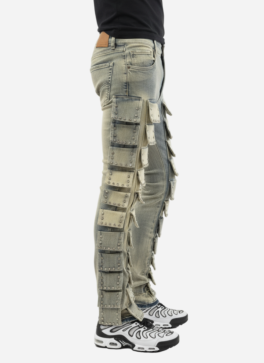 Person wearing light gray cargo pants with multiple pockets on a white background