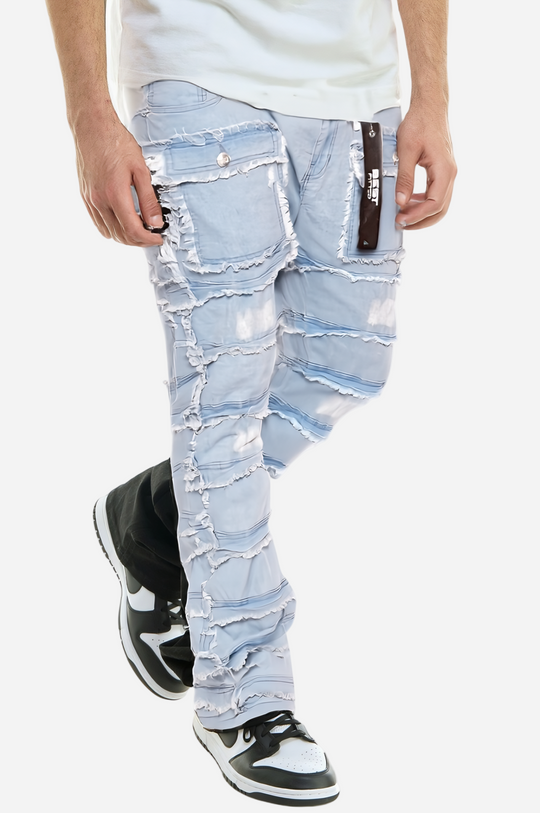 Light blue distressed jeans worn by a person on a white background